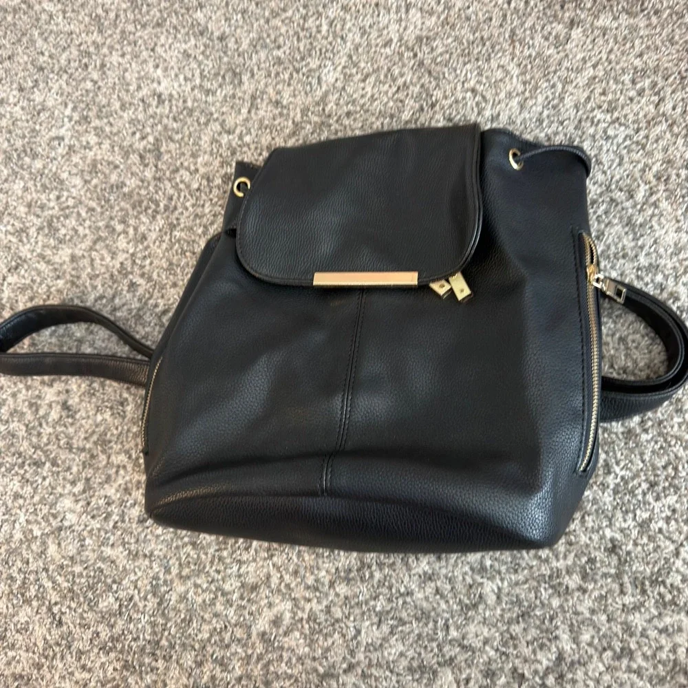 Black Pebbled Faux Leather Backpack Gold Hardware Drawstring Flap Closure